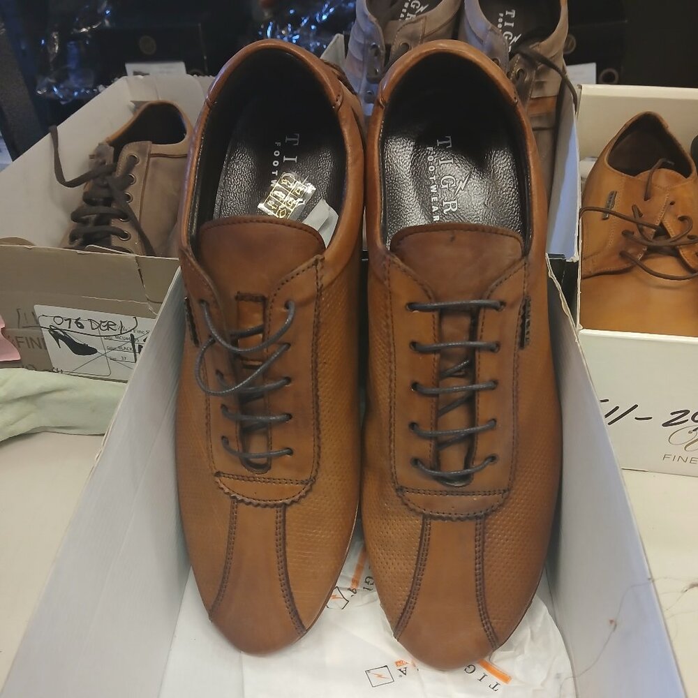 Leather lace up mens sneakers and walking shoes.